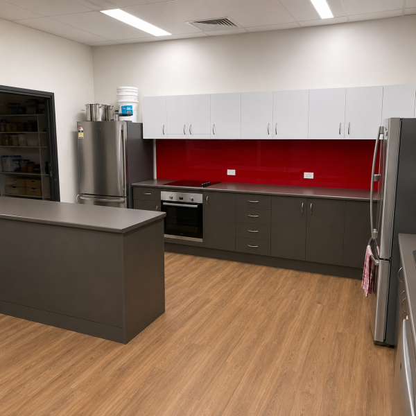 Anderson St Kitchens modern kitchen with bold red accents
