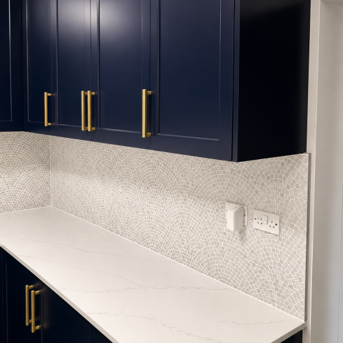 Inverell Laundry sleek modern kitchen with navy accents